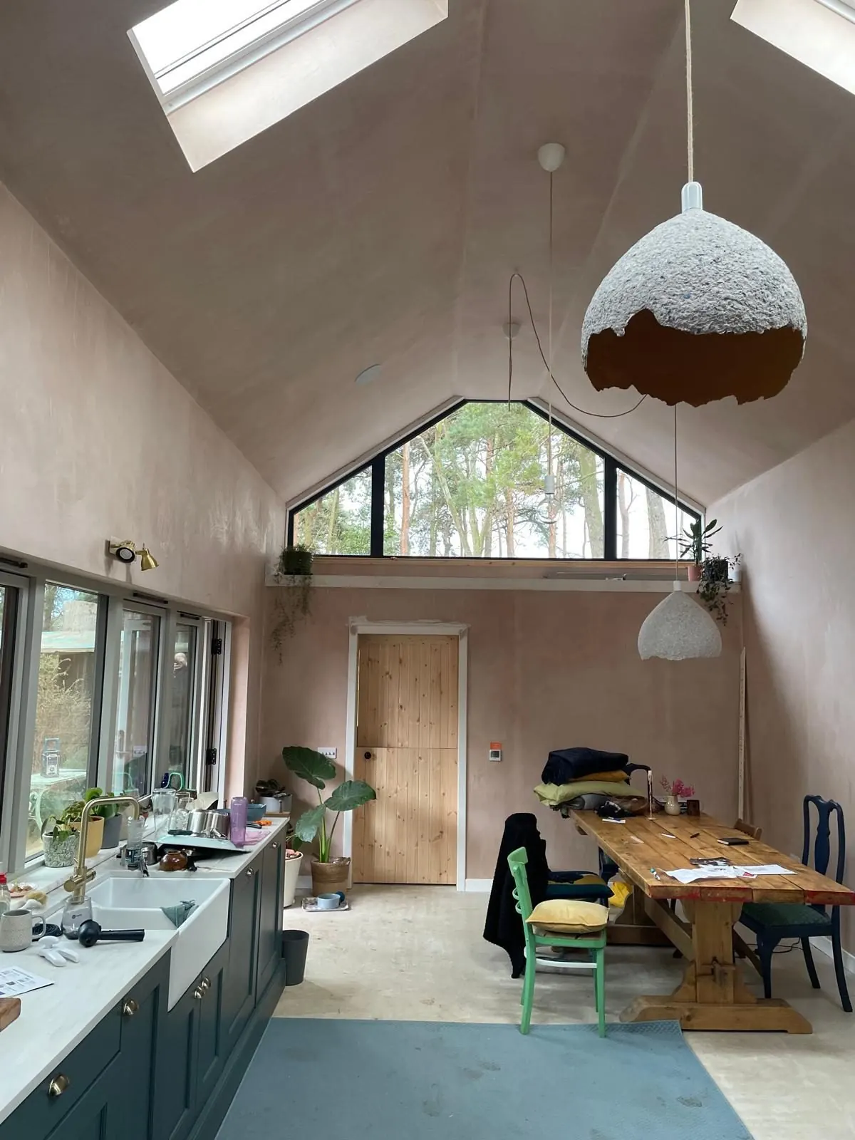 Vaulted kitchen and dining extension with gable glazing and rooflights by PAC Joinery and Building