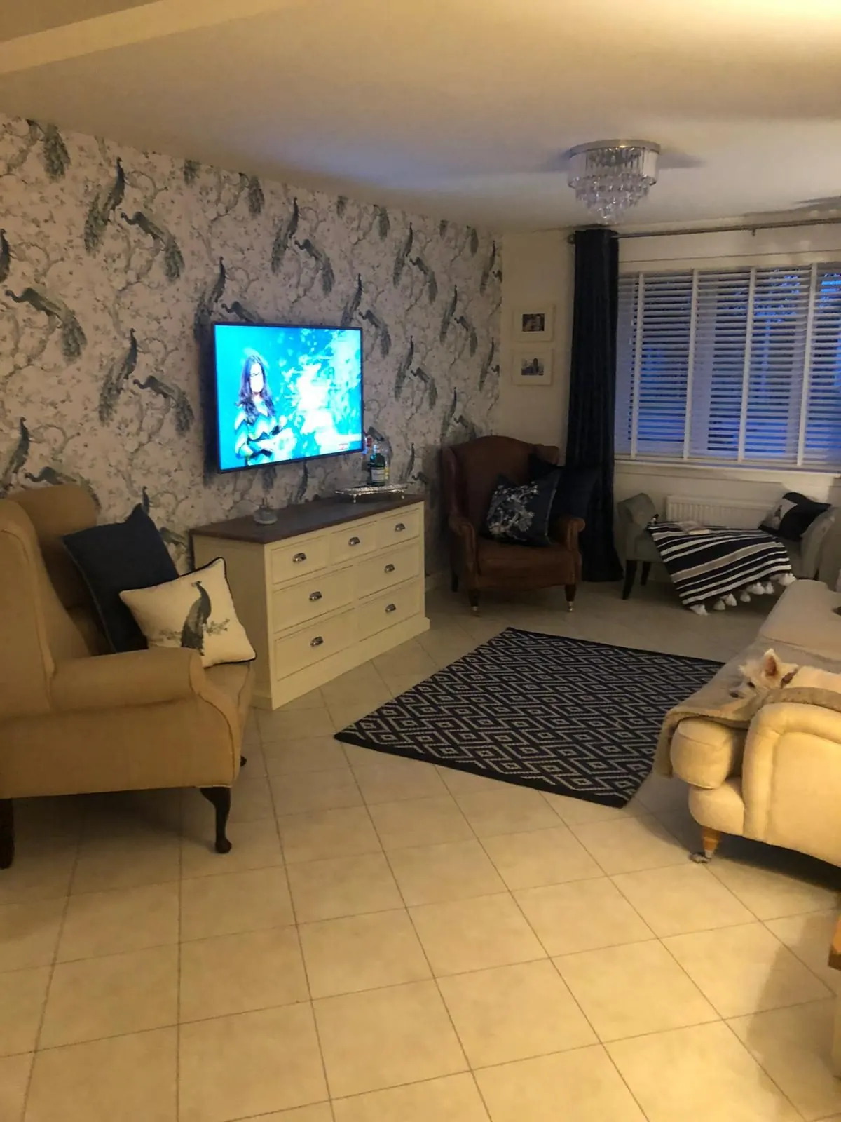 Renovated living room with feature wall and tiled floor in East Lothian