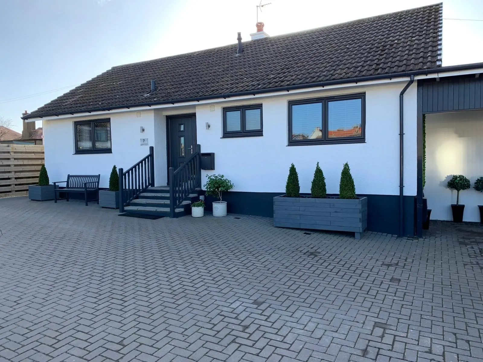 Renovated bungalow with new render, windows and driveway in East Lothian
