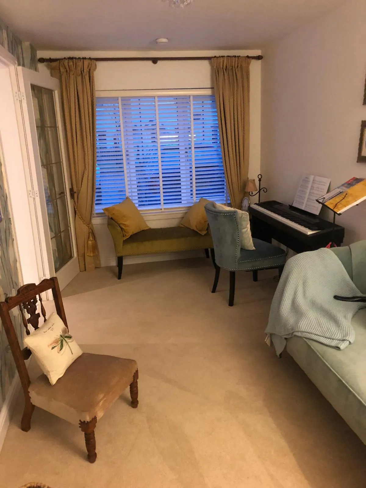 Garage conversion living room with window and carpet