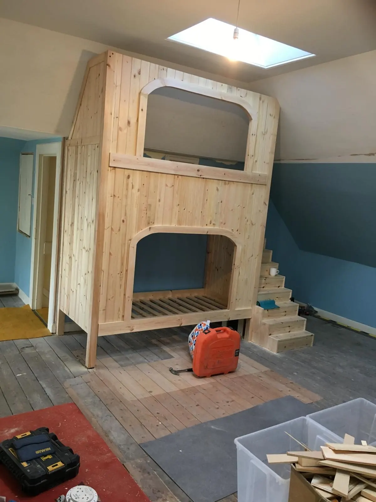 Handmade pine bunk bed with built-in steps by PAC Joinery and Building