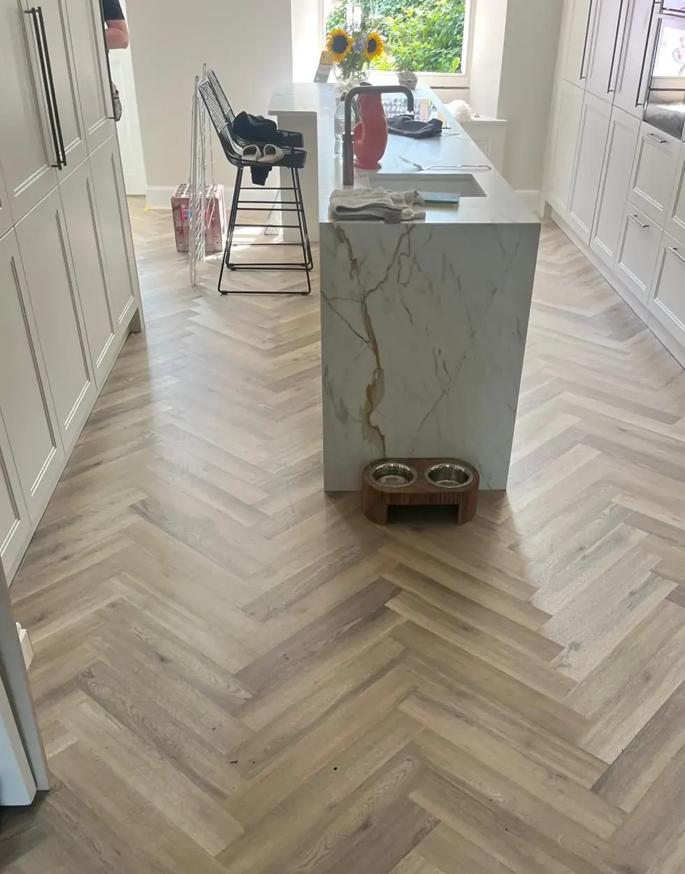 Herringbone floor installed through a modern kitchen in East Lothian